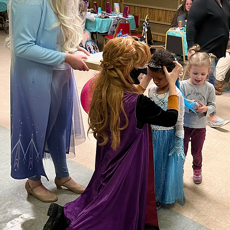 Princess performers interacting with children